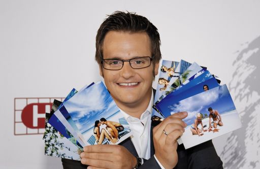 Robert F. Hartlauer mit Fotofächer