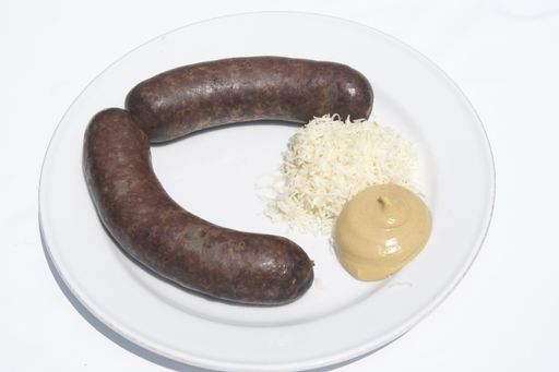 Vorschau Bild von Die besonders lockere und leichte Blunzen der Schinkenmanufaktur.Tschürtz überzeugte die französischen Gourmets bei der.Blutwurst-Weltmeisterschaft der Bruderschaft der Blutwurstritter in Mortagne.au Perche. In der Blutwurst sind Blut, Innereien und Semmeln verarbeitet..Durch die verwendeten Lebensmittel wird der Fettgehalt gegenüber anderen.Würsten deutlich gesenkt, die Wurst dadurch locker und leicht.