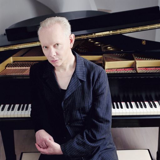  Joe seated in front of the piano