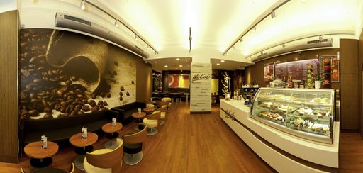 Vorschau Bild von Modernes Gastronomieerlebnis mit McCafé: Das McDonald's Restaurant am Wiener Schwarzenbergplatz heute.