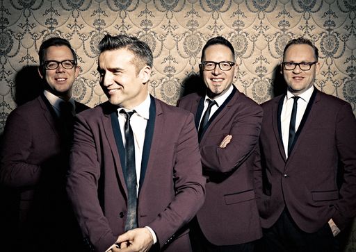  Band-Foto; The Monroes; vier Männer stehend; rote
Sakkos;