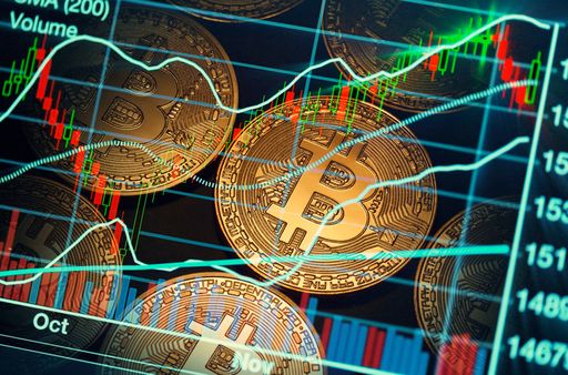 shiny bitcoins with stock market background.