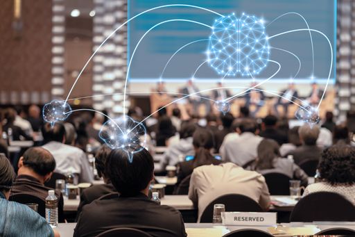 Brainstorming concept of Rear view of Audience
listening Speakers on the stage in the conference hall or seminar
meeting, business and education about investment concept