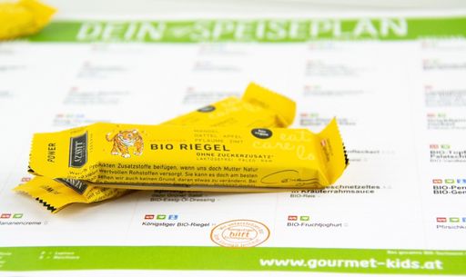 Vorschau Bild von GOURMET Kids Speiseplan mit „Königstiger hilft Schimpanse-Button“
und den Bio-Riegeln von NUSSYY(r)