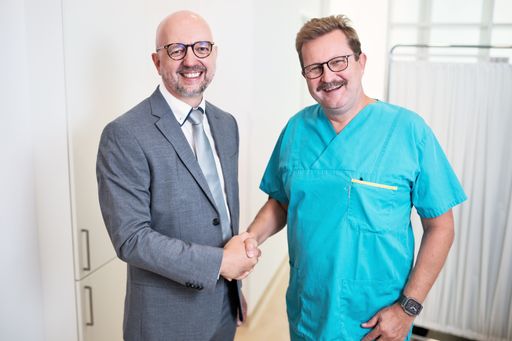  Mag. Alexander Lang und Dr. Erik Randall Huber