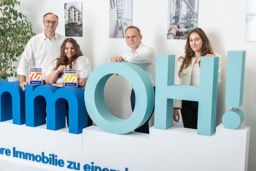 Das Team der immOH! mit den Awards.