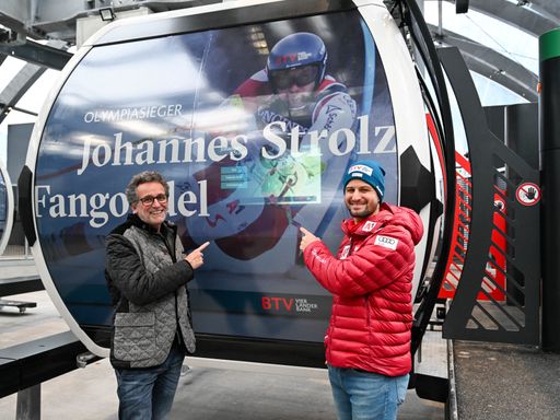  BTV Vorstandsvorsitzender Gerhard Burtscher und
ÖSV-Skirennläufer Johannes Strolz bei der Übergabe der neuen
Fangondel.