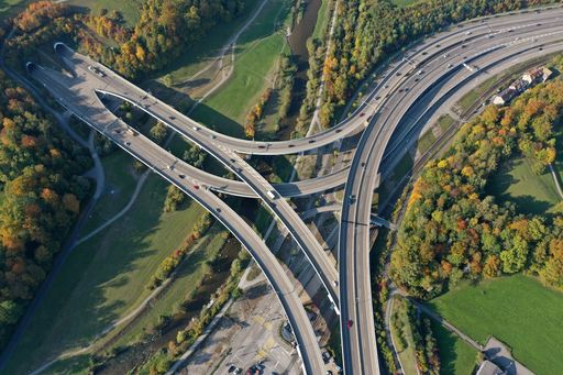 Zurich highway with several lines. some elevated.
The high angle image was captured during autumn season near Zurich
City.