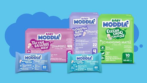 MODDIA Baby Produkte auf blauem Hintergrund