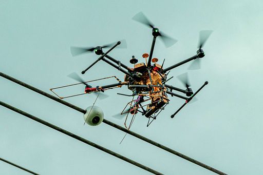 For the first time, sensors were installed on high-voltage lines using a drone during ongoing operation