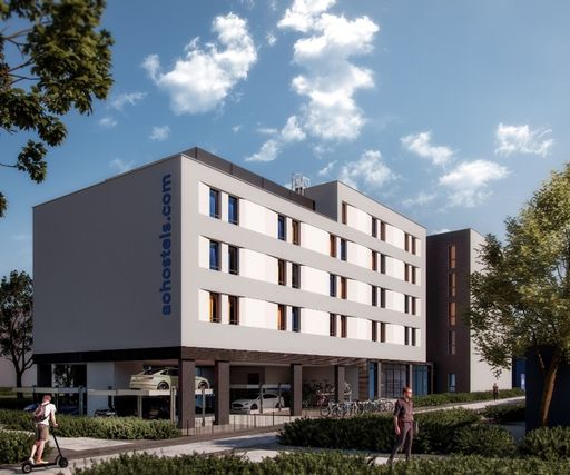 Visualisierung des geplanten a&o Hostel Heidelberg von Außen.
Modernes fünfstöckiges Gebäude umgeben von Bäumen mit
charakteristischem aohostels.com Schriftzug