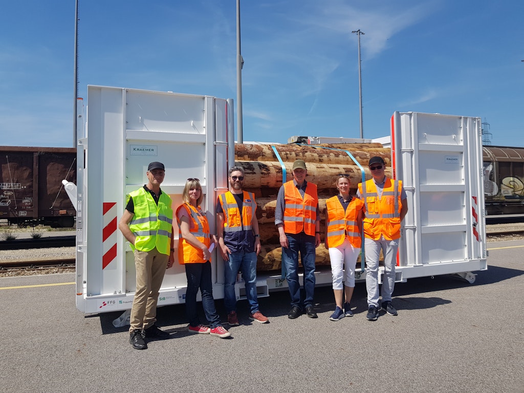 First intermodal container for logs and wood products